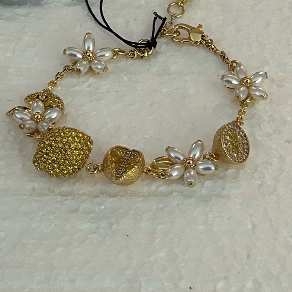 Kate Spade Gold Charm Bracelet with Whimsical Details - Picture 3 of 7